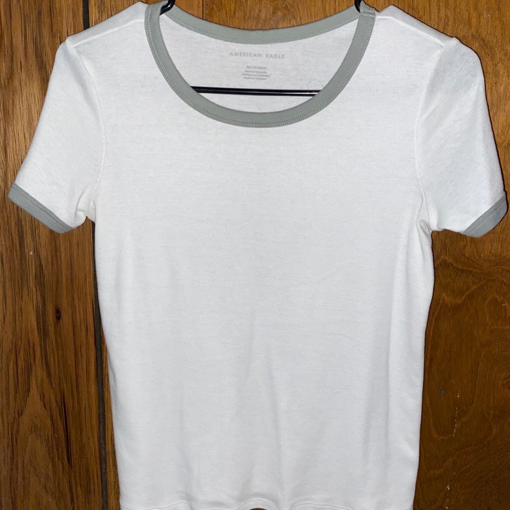 White and grey outlined t shirt